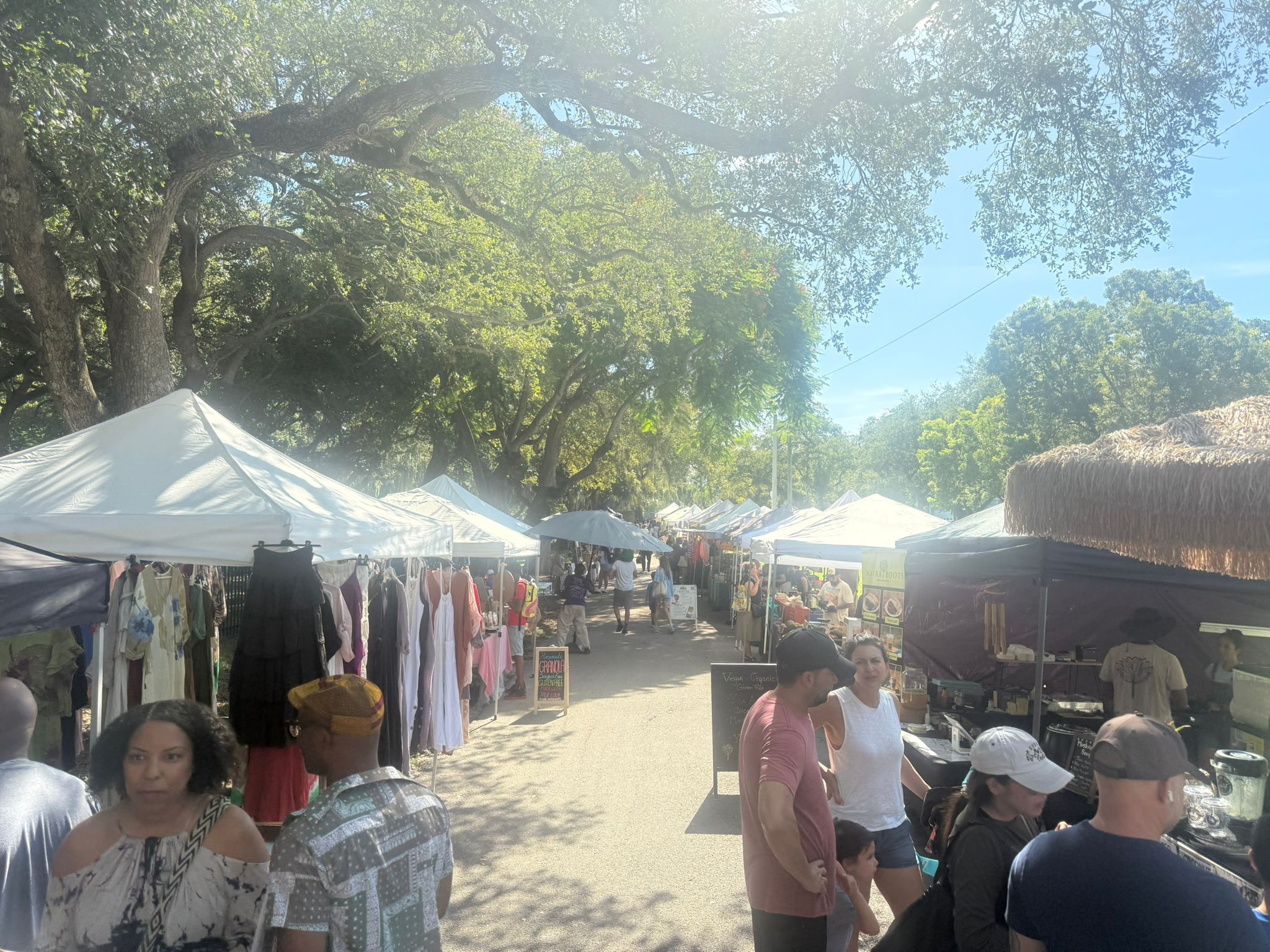 Clothing vendor alongside food stalls
