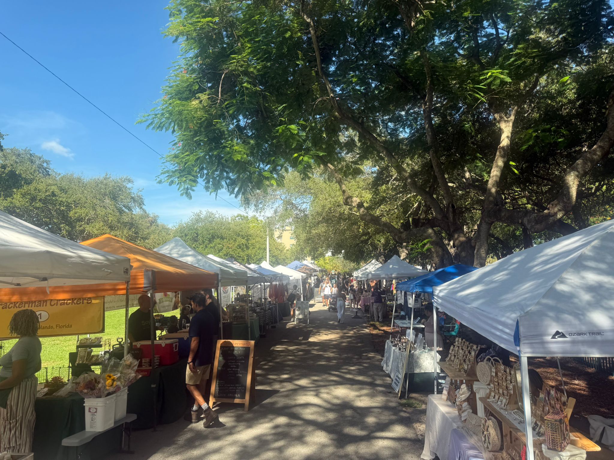 Vendor booths and visitors walking the aisles
