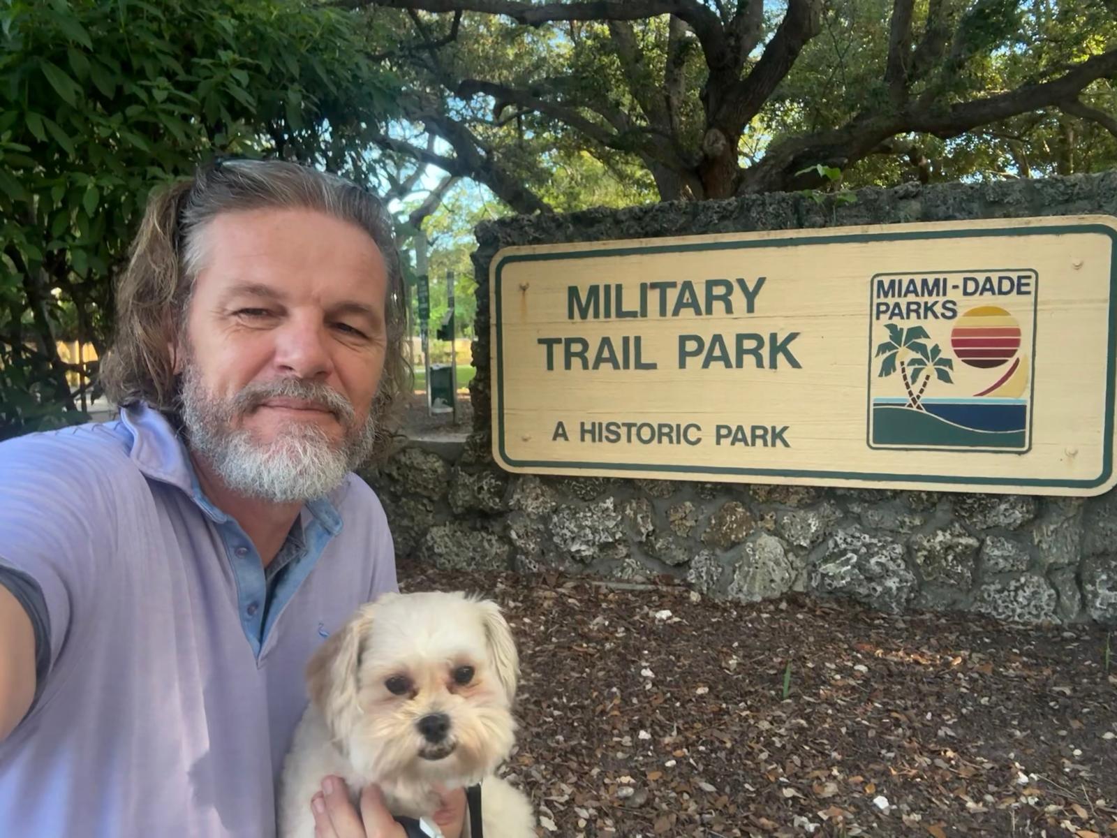 Pip and Burger at park sign
